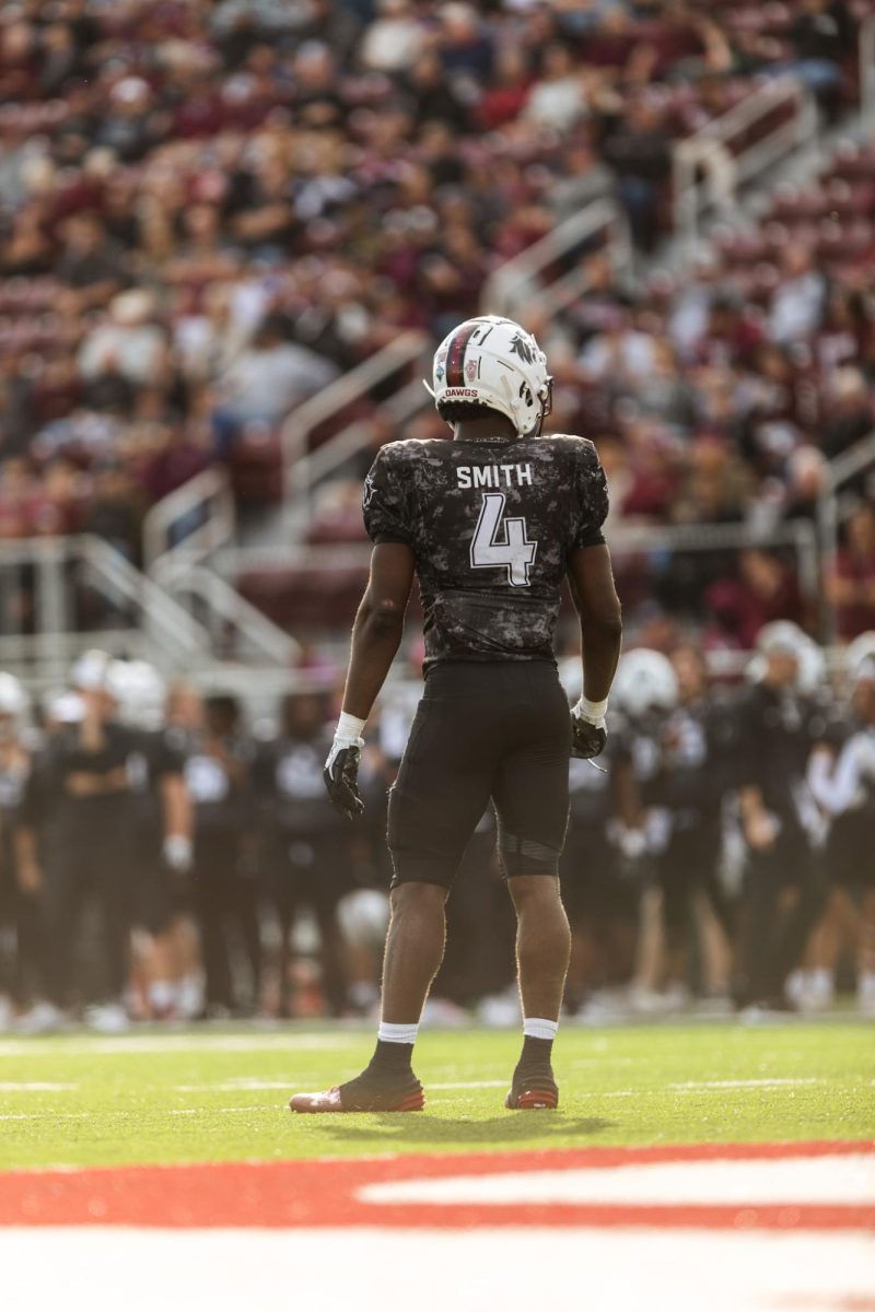 PJ Jules (4) wears the name ‘Smith’ on the back of his jersey for the annual Blackout Cancer game Nov. 4, 2023 at Saluki Stadium in Carbondale, Illinois. Saluki fans had a chance to bid for a specialized name on jerseys to raise money for the Coach Kill Cancer Fund.