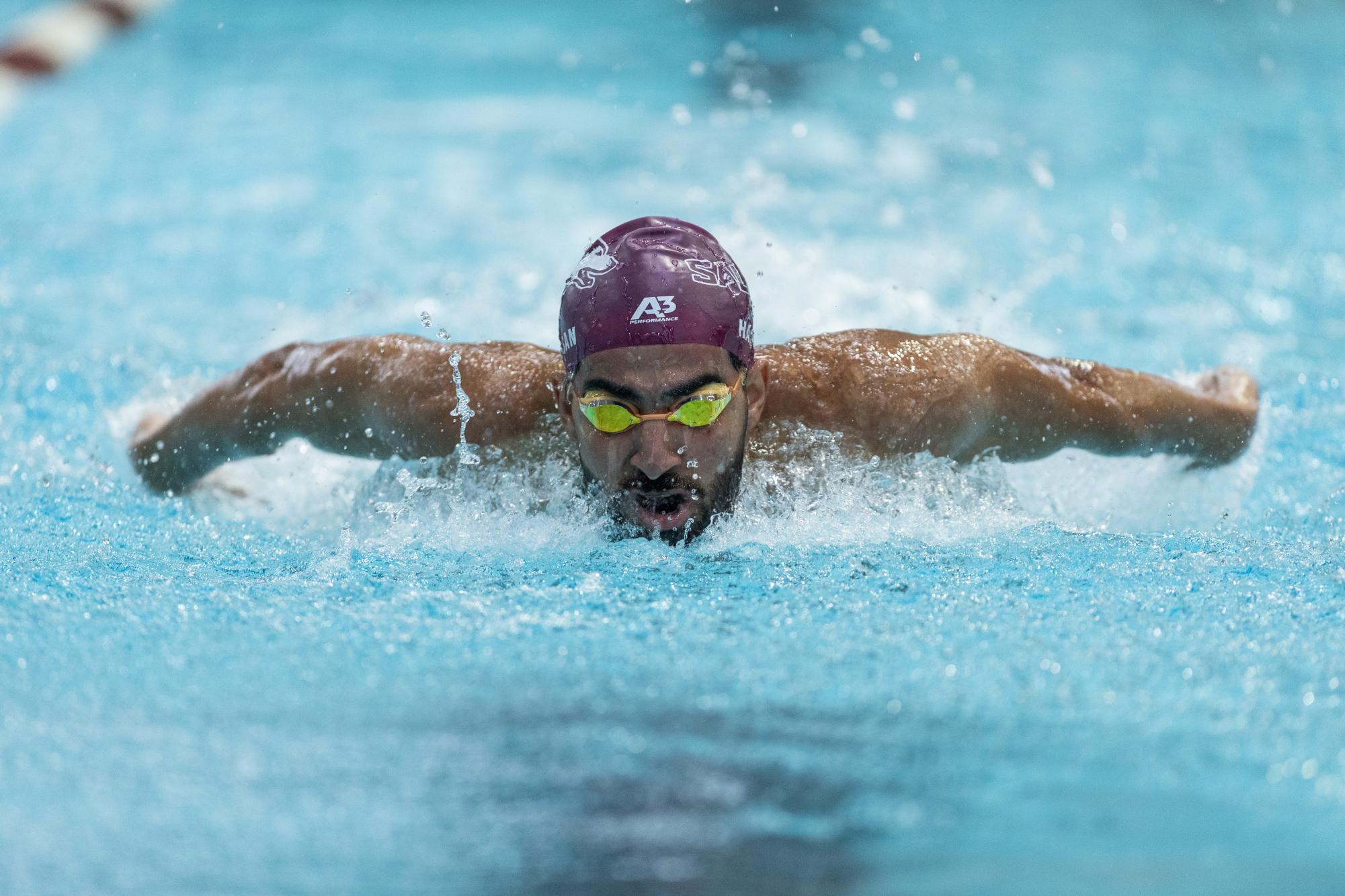Selim Hassan propels through the water as he swims the men’s 200m butterfly Oct. 6, 2023 at Dr. Edward Shea Natatorium in Carbondale, Illinois.