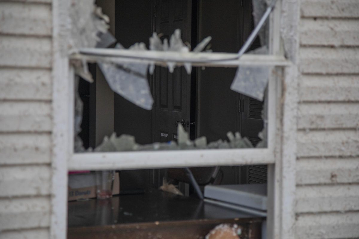 A broken window exposes the inside of an Eldos Trace apartment Dec. 10, 2023 in Clarksville, Tennessee. 