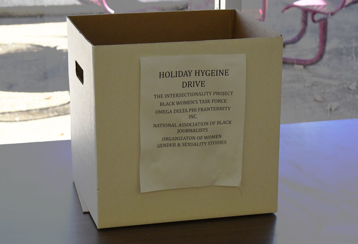 A Holiday Hygiene Drive box sits on a table at SIU’s Communications Building in Carbondale, IL on Wednesday, Nov. 29, 2023.