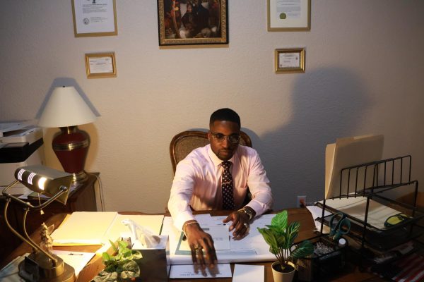 After a long day Diamante Jackson organizes his office desk. His office is located at Southern Cremation And Burial Service in Murphysboro, IL. February 20th, 2024
