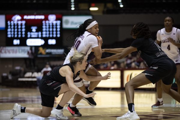 SeQuoia Allmond (40) pushes through the Missouri State defense as she moves towards the basket Feb. 3, 2024 at Banterra Center in Carbondale, Illinois