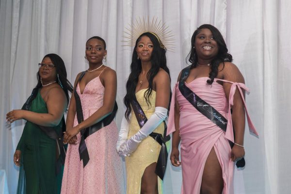 Jakayla Sherrod, Bella Musselman, Naomi Greer, KaMahri Scott wait as the other 2024 Ebony Ball Court contestants to be announced at the 3rd annual Ebony Ball. Naomi Greer won Miss. BAC Senior and KaMahri Scott won Miss. BAC freshman. 