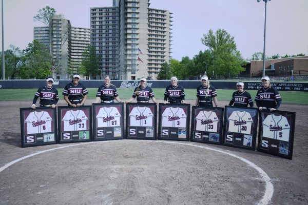 The 8 SIU Softball seniors stand for a group photo together on Senior Day April 20, 2024 at Charlotte West Stadium in Carbondale, Illinois. Jason Isele | @iselephotography