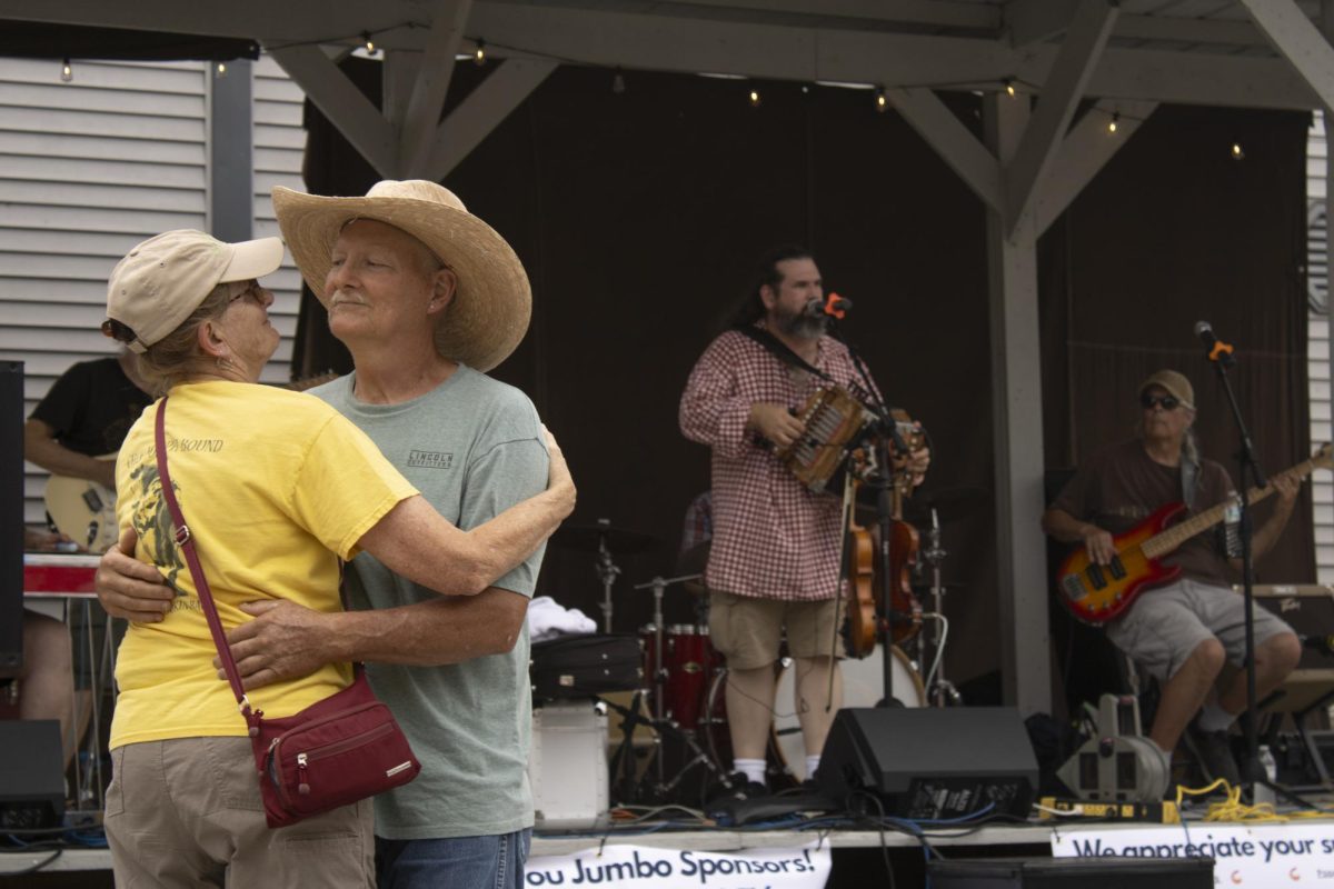 Daryl and Debbie Gittings dance to the music of the Creole Stomp band Sept. 17, 2024 at the Golconda Shrimp Festival in Golconda, Illinois.  The Gittings traveled from Allendale Illinois to visit the shrimp festival.  