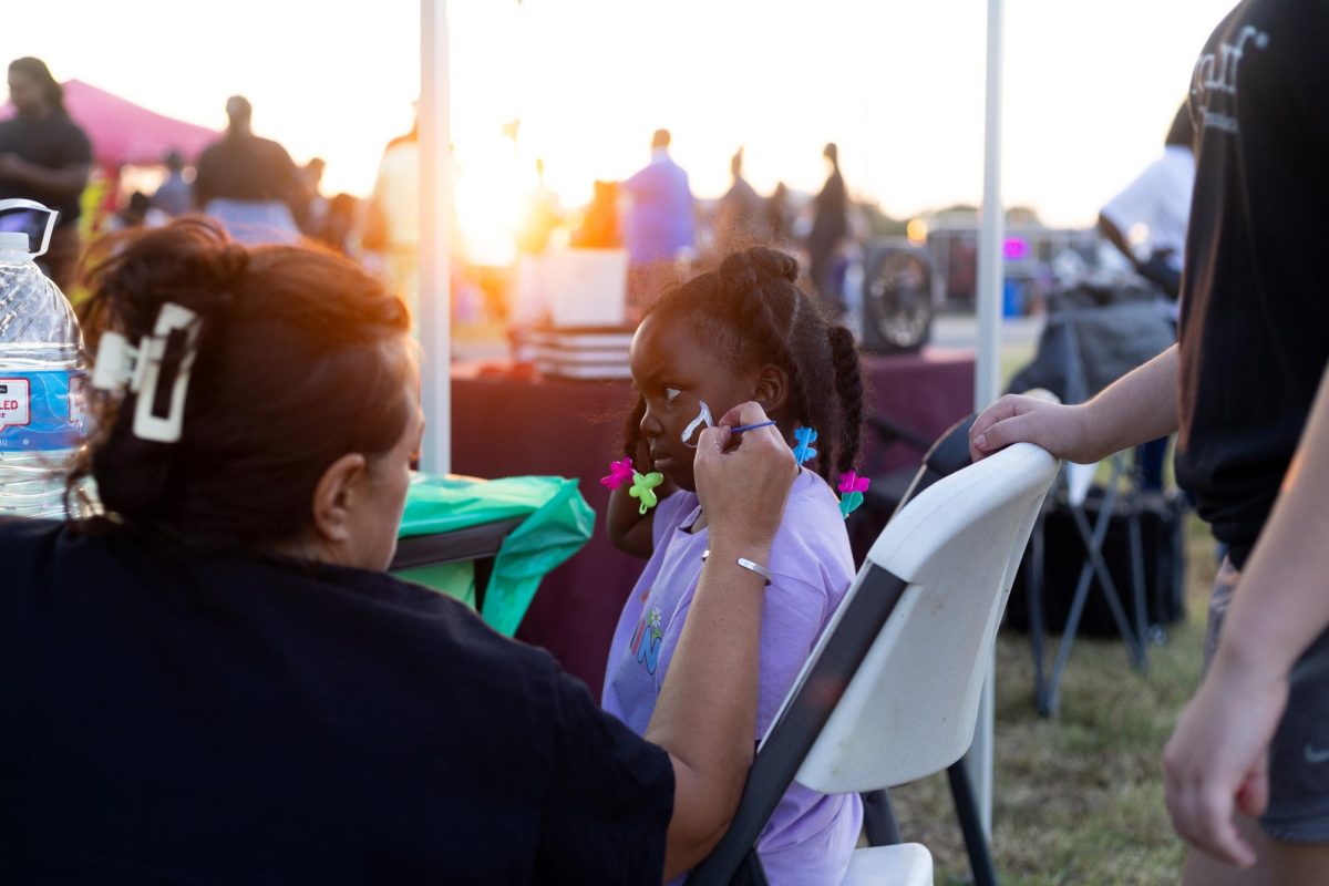 Randy Meadows paints a unicorn design on the face of young Zo’e Allen as the sun goes down over the Heritage Blues and
Gospel Festival Sept. 6, 2024 in Cairo, Illinois. @fox.flicks