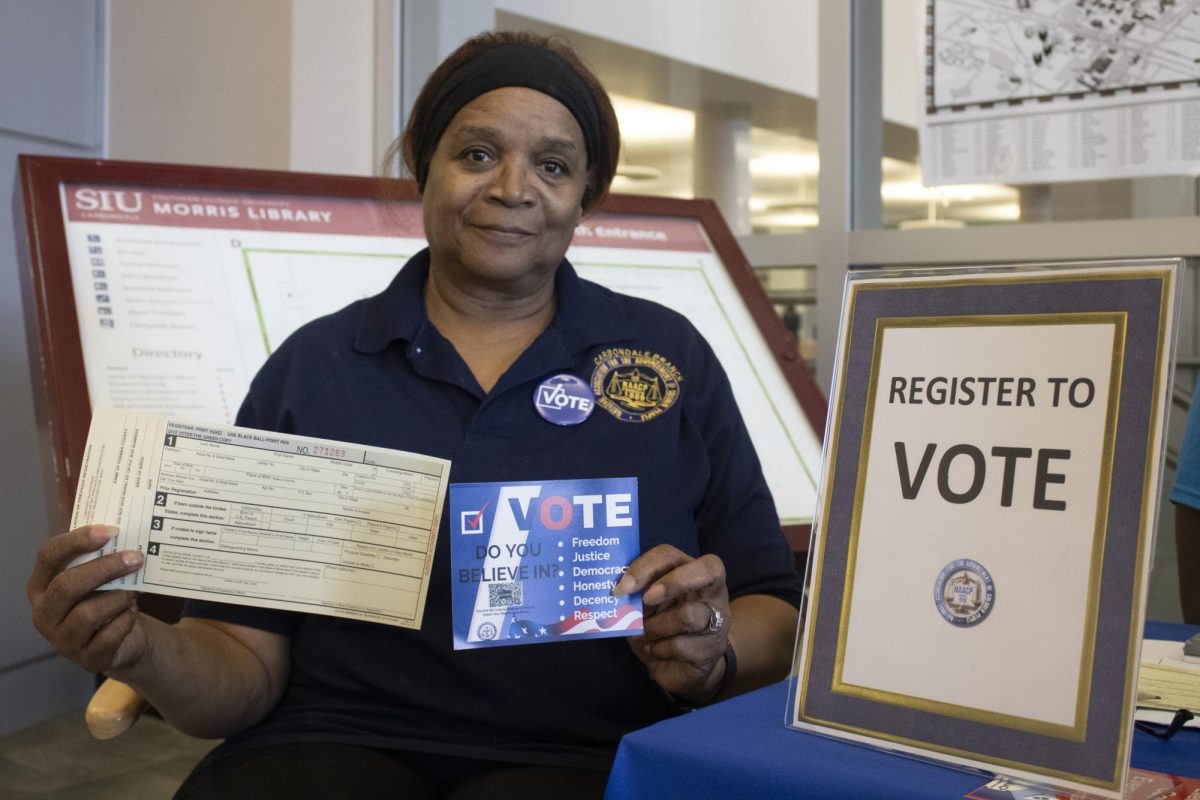 Linda Flowers poses for a portrait while at a voting registration booth in the Morris
Library Sept. 26, 2024 at SIU in Carbondale, Illinois. Linda Flowers is president of the
Carbondale branch of NAACP which organized the voting registration booth.