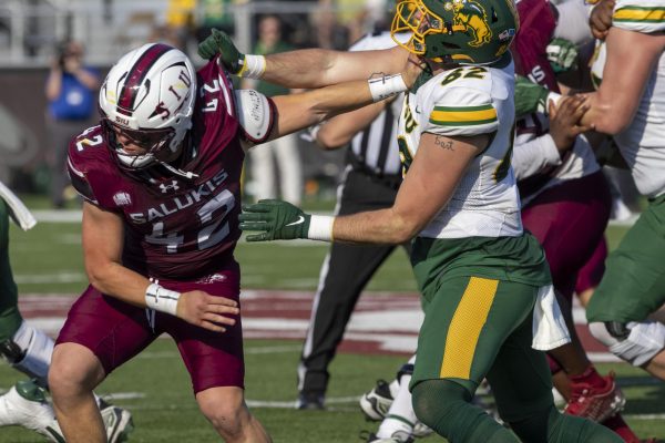 Shane Roth (42) guards North Dakota State Joe Stoffel (82) of North Dakota State as the Salukis faced the No. 2 Bison for homecoming October 12, 2024 at Saluki Stadium in Carbondale, Illinois.