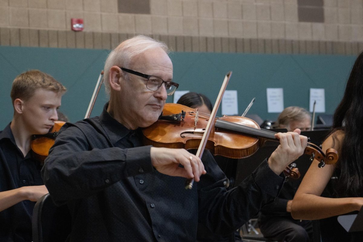 Professor Michael Barta plays his violin Oct. 13, 2024 at Altgeld Hall in Carbondale, Illinois