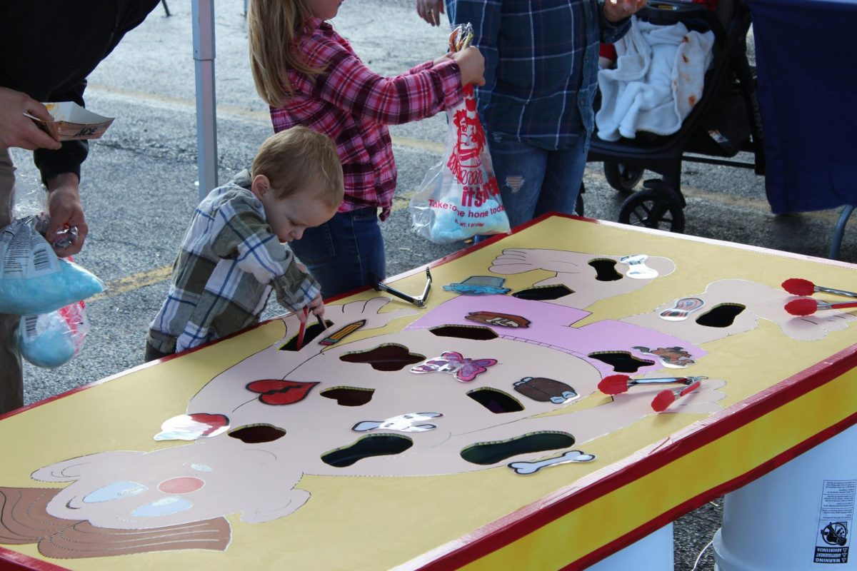 Local children play life-sized Operation at the Murdale Shopping Center for Safe
Howl-o-Ween on Oct. 26 in Carbondale, Illinois