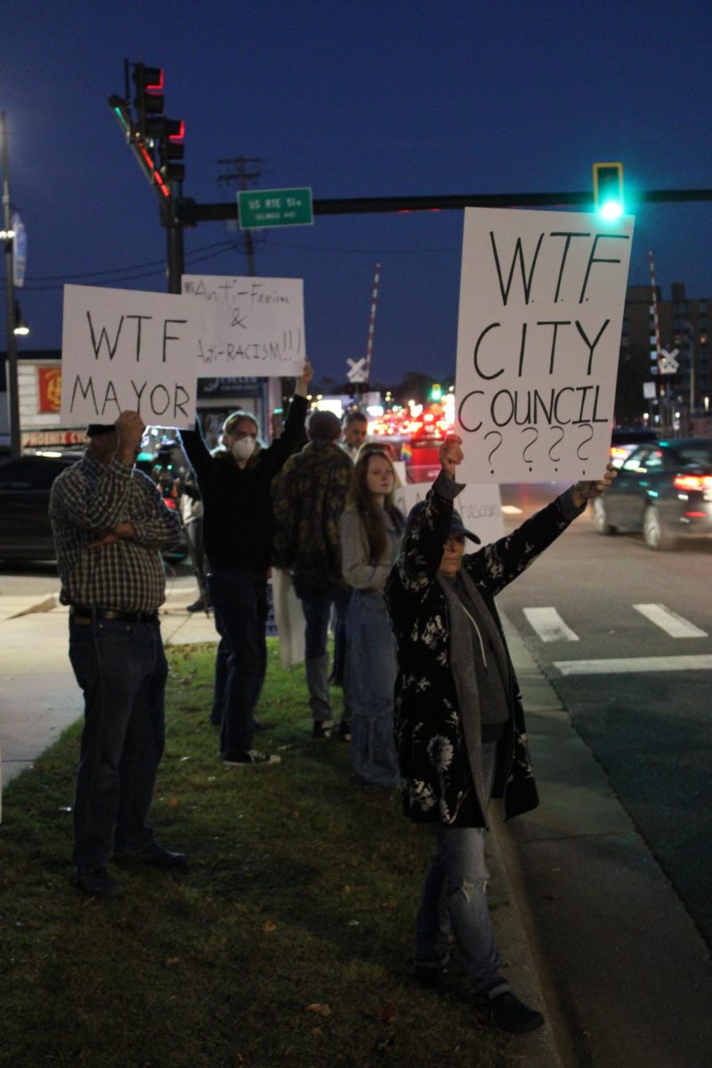 Citizens of Carbondale hold signs for protest outside of Carbondale City Hall. Nov 12, 2024
