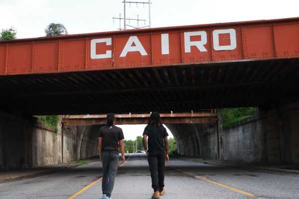 Domarion Nunez and Kevin Robinson walk towards town April 26, 2024 in Cairo, Illinois. Kids who grow up in communities that suffer from limited resources will also grow up in communities that have higher crime rates, making it pivotal for children to have outlets - like basketball. The town faces many obstacles including population decline, housing disparity, poverty and lack of government funding. 