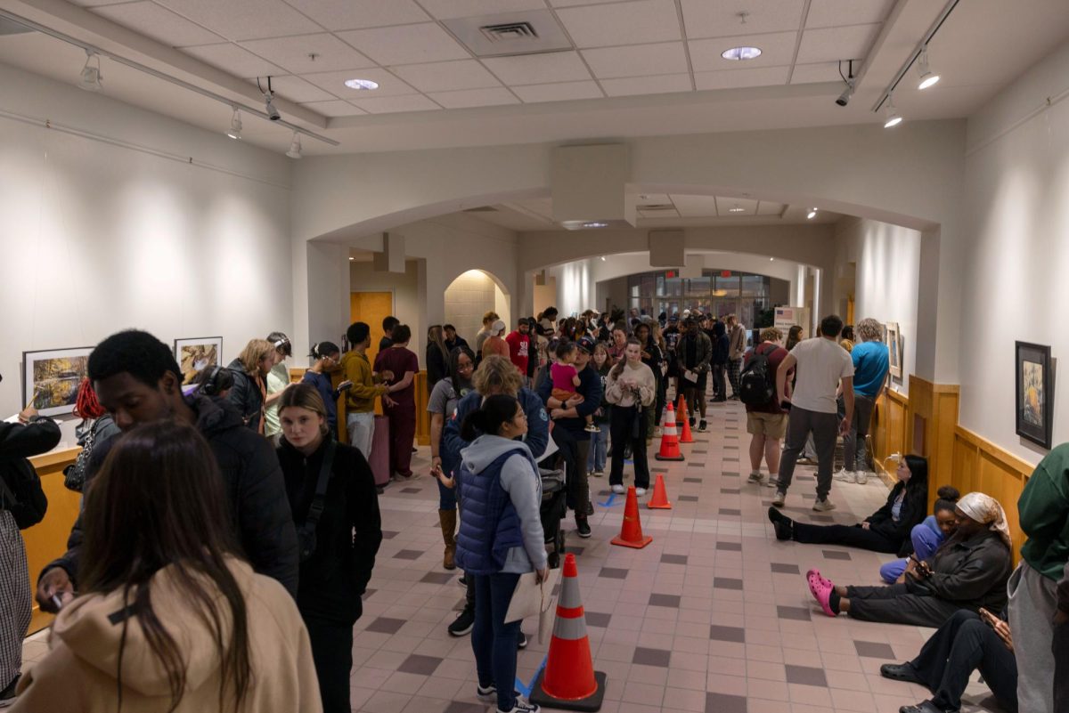 Carbondale citizens line the hall of the Carbondale Civic Center waiting to vote Nov. 5, 2024 in Carbondale, Illinois. 