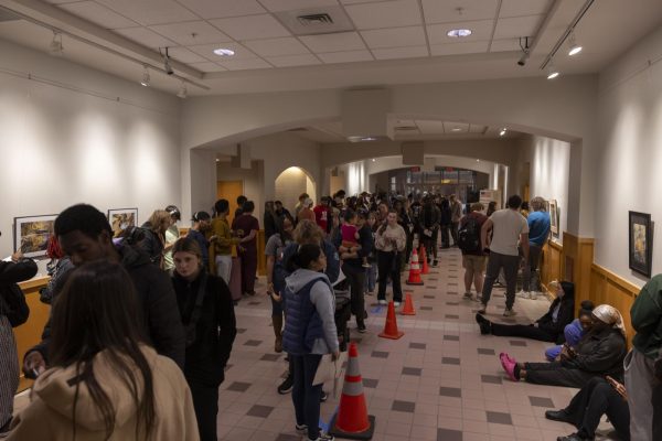 Carbondale citizens line the hall of the Carbondale Civic Center waiting to vote Nov. 5, 2024 in Carbondale, Illinois. 
