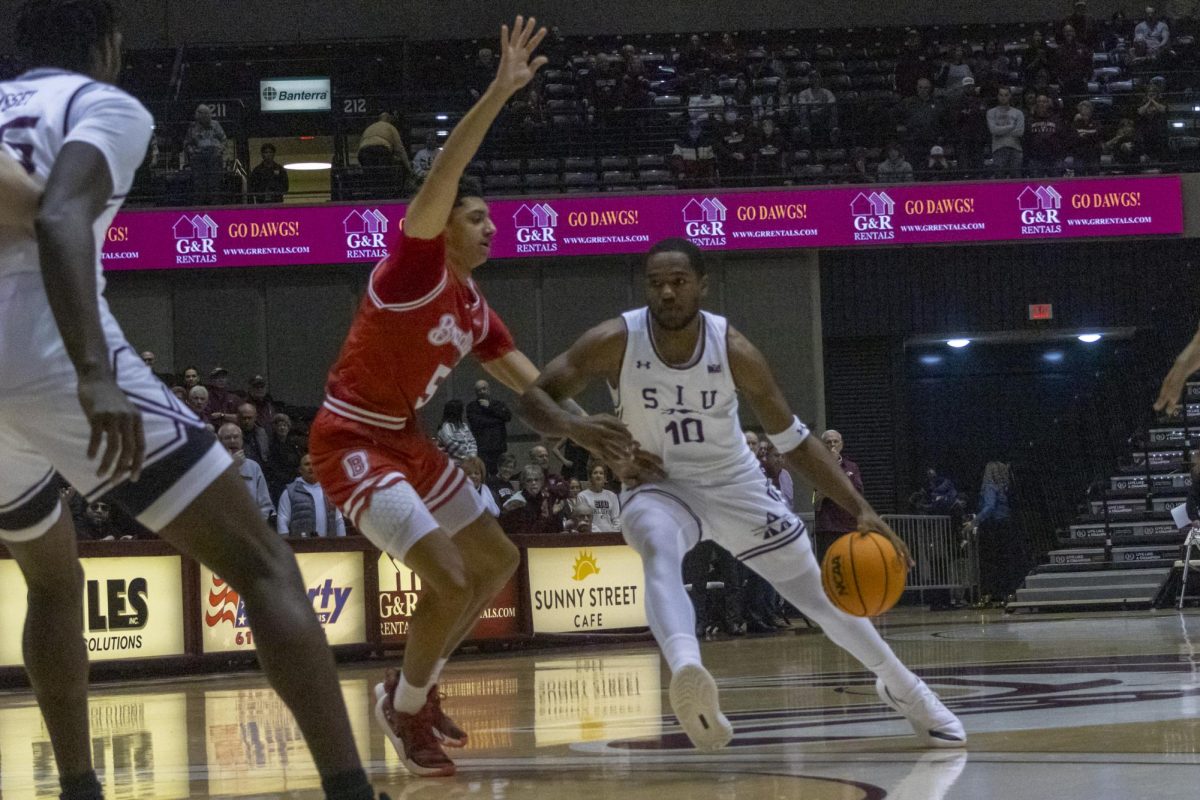 Damien Mayo Jr. drives to the basket against the Bradley Braves on Tuesday, December 3, 2024.