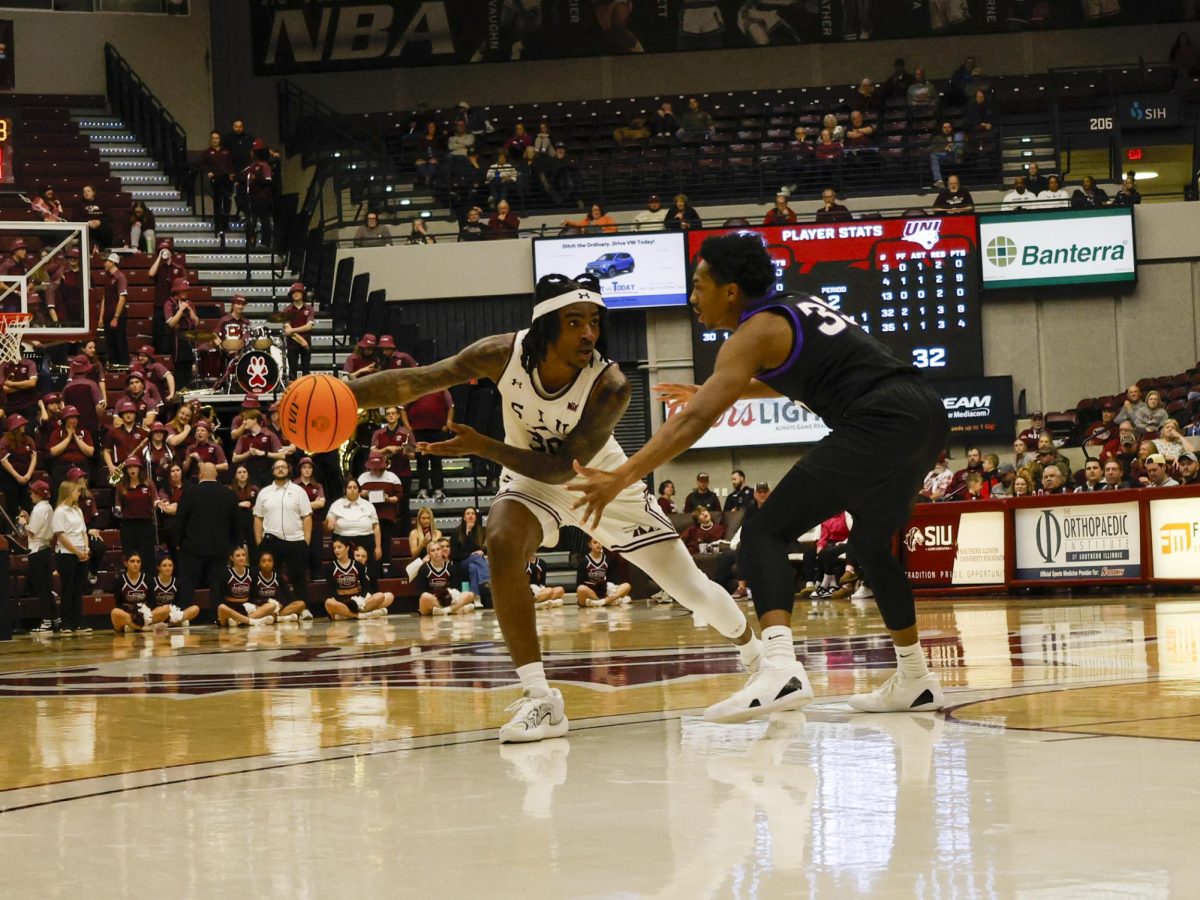 Kennard Davis Jr. crosses up  Leon Bond III during a matchup with the University of Northern Iowa on Jan. 18, 2025 in the Banterra Center in Carbondale, IL.