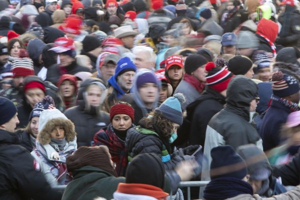 Trump supporters wait in frigid weather and move through the line to enter Capital One Arena where a live stream of the swearing-in ceremony was shown Jan. 20, 2025 in Washington, D.C.