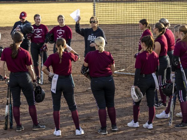 Head Coach Sewell talks with SIU softball during practice as they prepare for the spring season Jan. 31, 2025 at Charlotte West Stadium in Carbondale, Illinois.