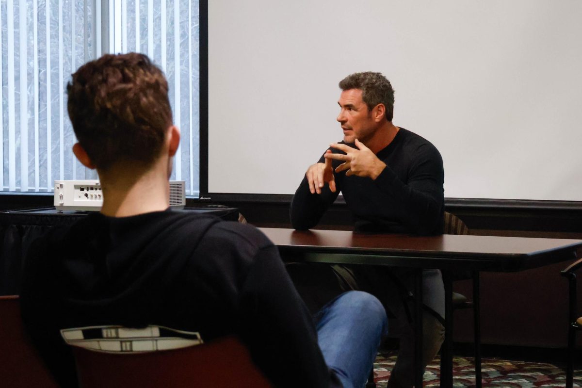 Actor Dan Payne shares his experiences working in film and television during a panel at the Saluki Con event Feb. 15, 2025 at the SIU Student Center in Carbondale, Illinois. 