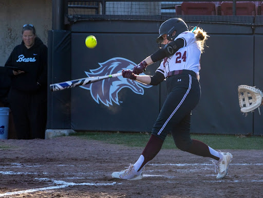 Erin Lee (24) drives the ball towards the left field against Central Arkansas this past Friday, Feb. 28th, 2025 at Charlotte West Stadium in Carbondale, Illinois.
