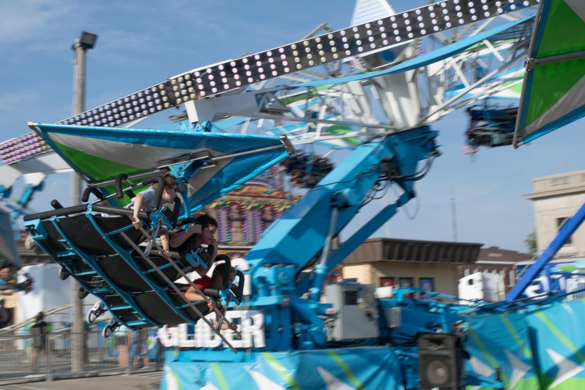 Children ride on the Glider at the Festival Funland Sept. 12, 2025 at the Murphysboro Apple Festival in Murphysboro, Illinois. 