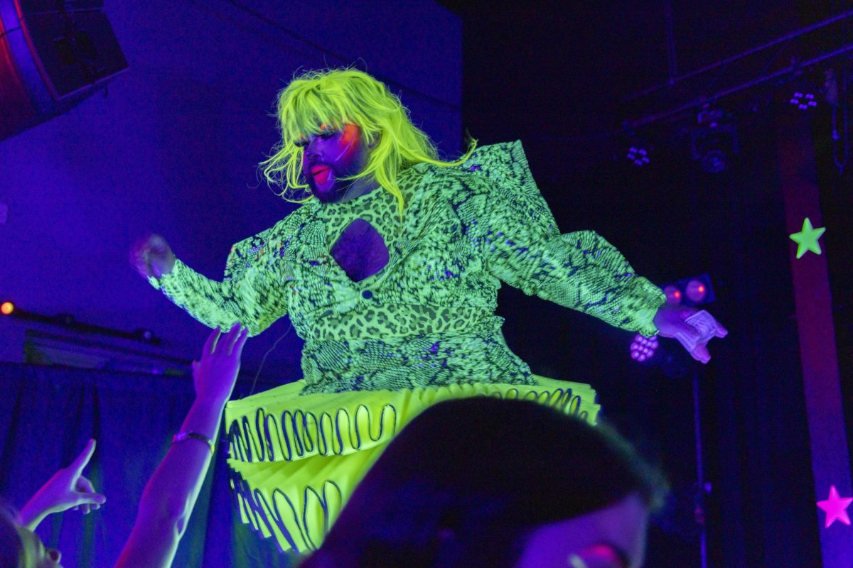 Naya Quetzal leans towards the crowd while performing Sept. 6, 2025 at Hangar 9 in Carbondale, Illinois. 