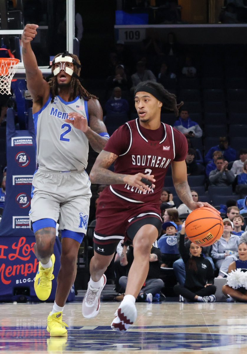 SIU guard Quel’Ron House dribbles up court Nov. 26, 2025 at the FedExForum in Memphis, Tennessee. 