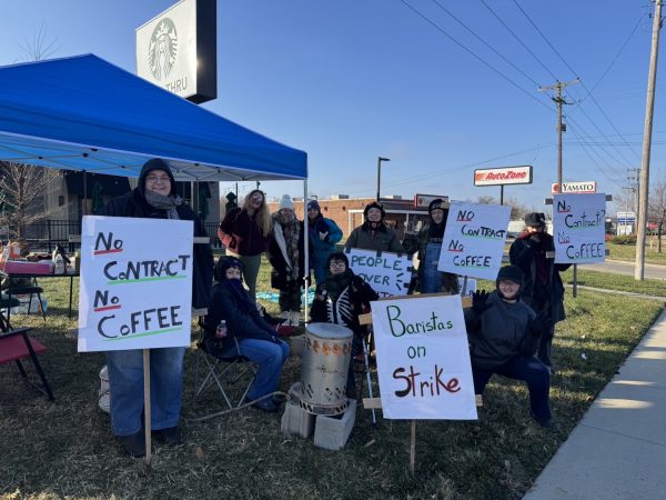 Starbucks employees on strike gather in front of the Main Street Starbucks location Dec. 8, 2025 in Carbondale, Illinois. 
