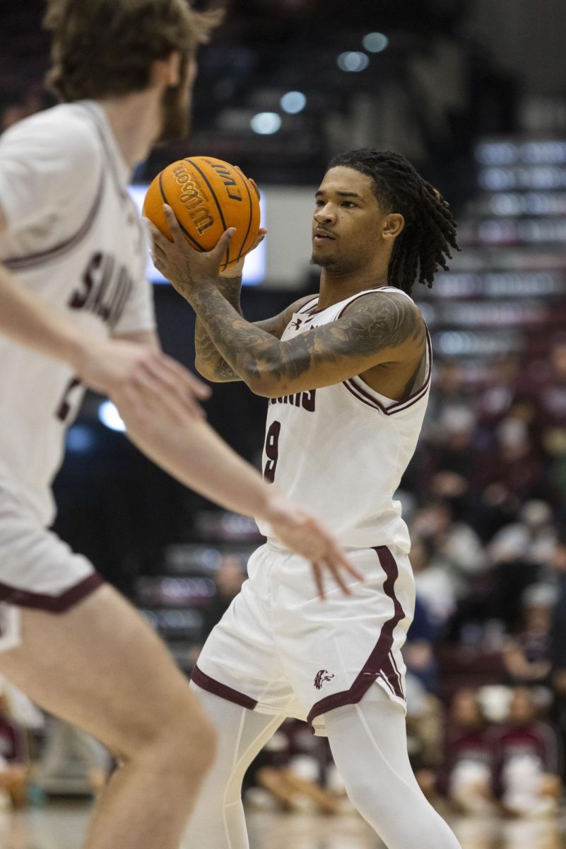 SIU guard Isaiah Stafford (9) looks to pass the ball Nov. 29, 2025 at Banterra Center in Carbondale, Illinois.