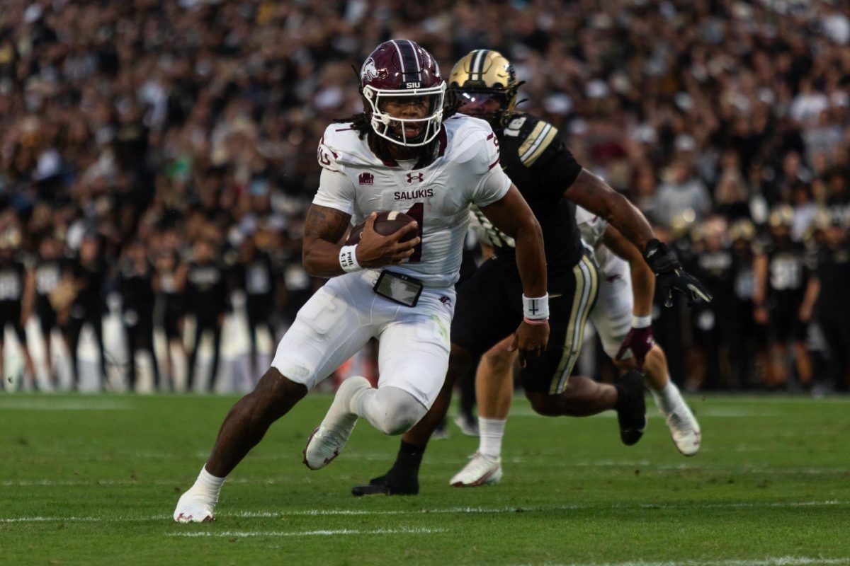 Saluki quarterback DJ Williams (1) runs the ball into the end zone on the first drive of the game to put the Dawgs up 7-0 early in the first quarter against Purdue Sept. 6, 2025 at Ross-Ade Stadium in West Lafayette, Indiana. 