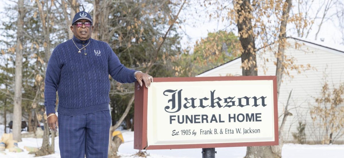 Owner Larry Walton stands by the sign of Jackson Funeral Home that opened in 1905 Feb. 2, 2026 in Carbondale, Illinois. 