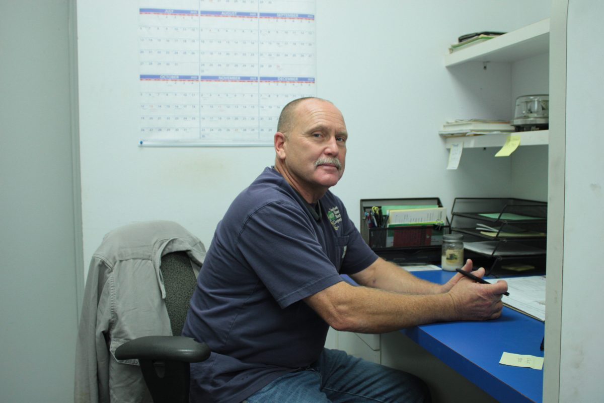 Dale Guetersloh sits for a portrait Oct. 3, 2025 in his office cubicle in Metropolis, Illinois.