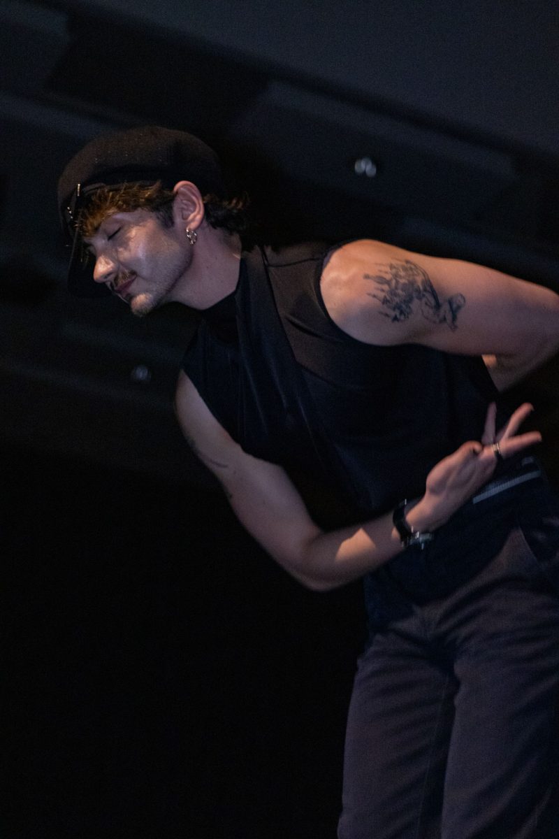 Designer Noah Eaton bows after receiving applause from the audience at SIU's fashion show April 23, 2026 in SIU's student center ballrooms in Carbondale, Illinois.