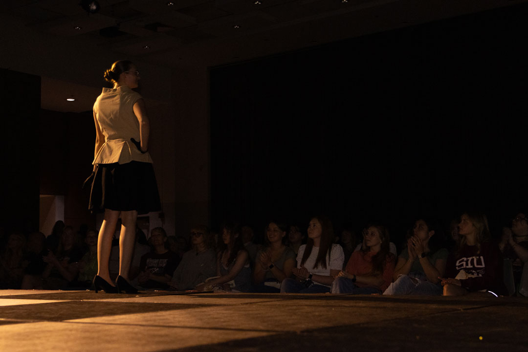 Model and audience at SIU's fashion show April 23, 2026 in SIU's student center ballrooms in Carbondale, Illinois.