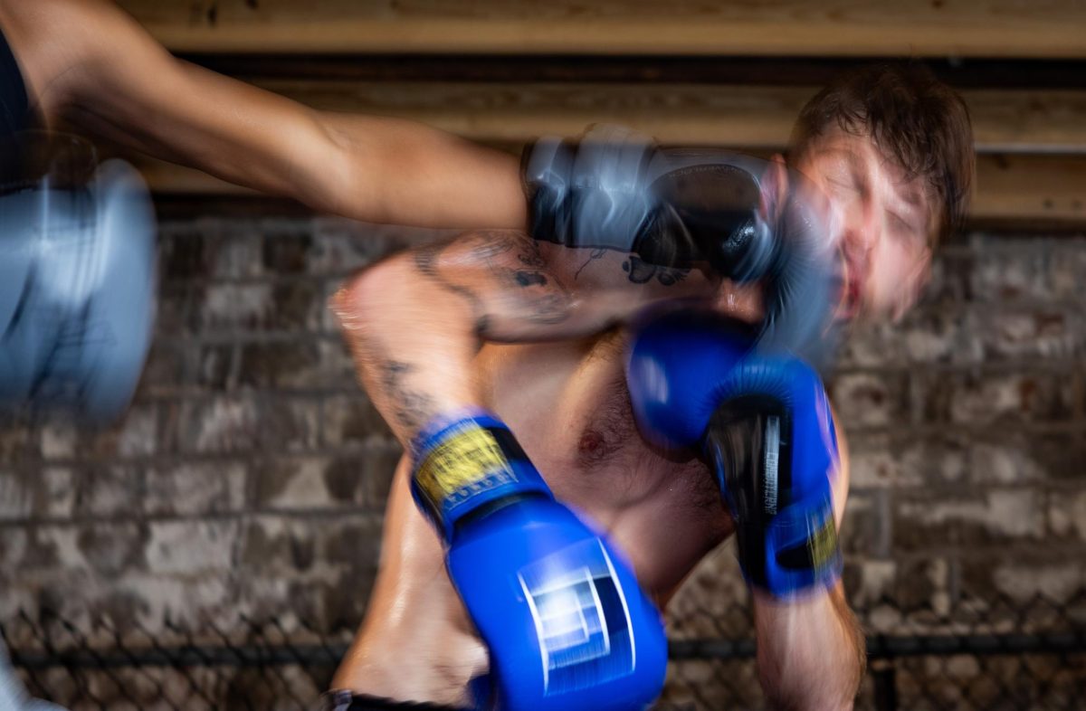 Jacob Crawford takes a punch while sparring April 25, 2026 at So Ill Syndicate gym in Carbondale, Illinois.