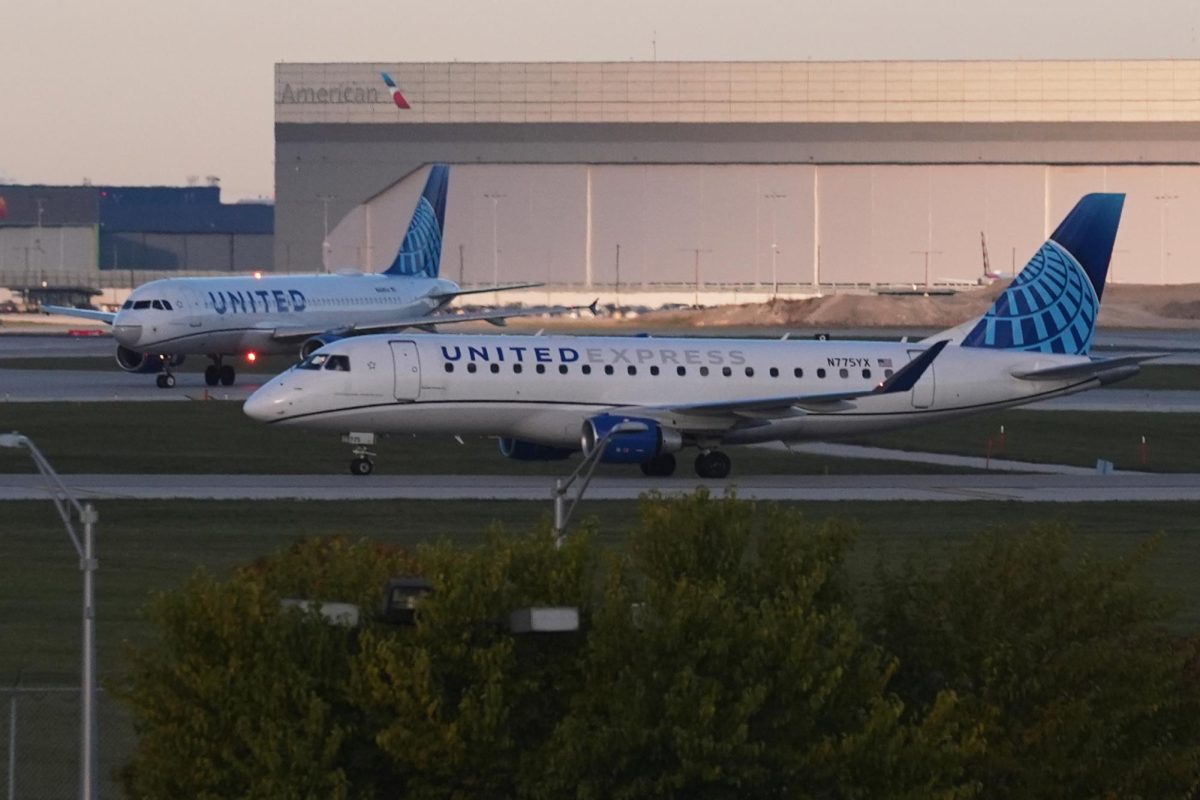 United Express airline planes are arrived at O'Hare International Airport in Chicago, Monday, Nov. 3, 2025. (AP Photo/Nam Y. Huh)